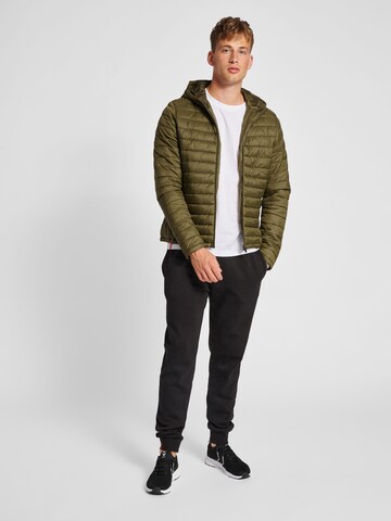 Veste mi-saison Hummel en vert