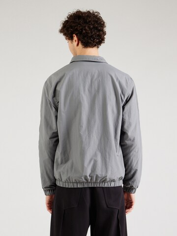 Veste mi-saison Karl Kani en gris