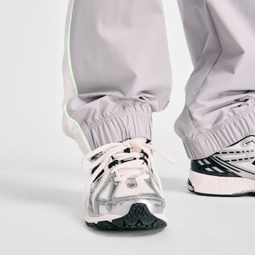 new balance Wide leg Sportbroek 'Trackside Woven Pant' in Grijs