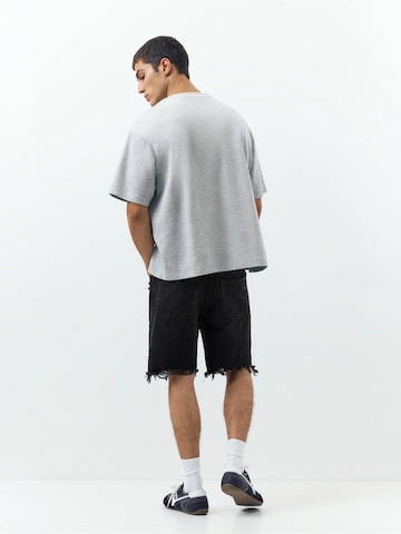 Pull&Bear Ohlapna forma Kavbojke | črna barva