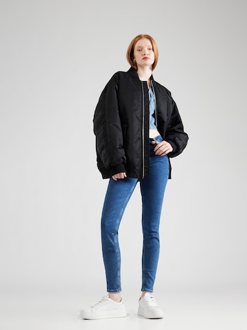 Tommy Jeans Skinny Jeans 'NORA MID RISE SKINNY' in Blauw