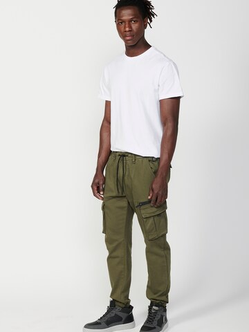 KOROSHI Tapered Cargobroek in Groen