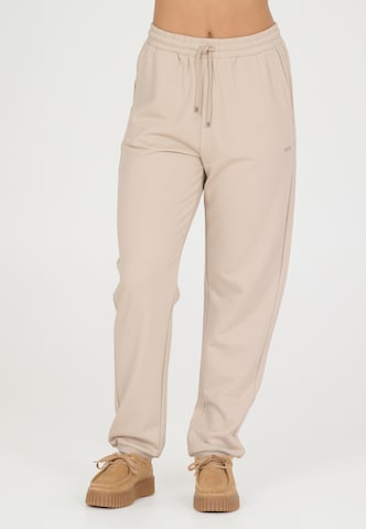NOU Loose fit Workout Pants 'Vacay' in Beige: front