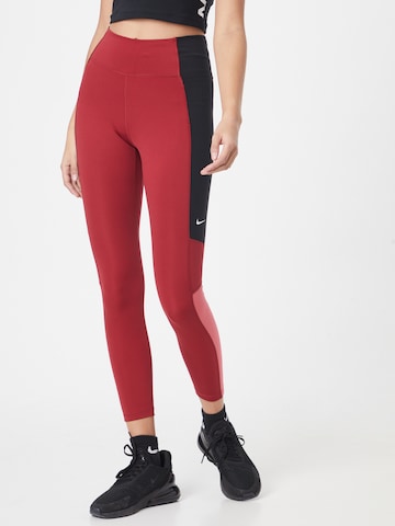 NIKE Skinny Workout Pants in Red: front