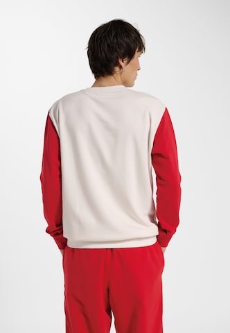 T-Shirt fonctionnel Hummel en blanc