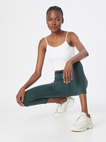 Skinny Pantalon de sport Girlfriend Collective en vert