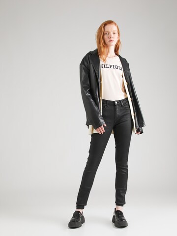 TOMMY HILFIGER Skinny Farkut 'Como' värissä musta