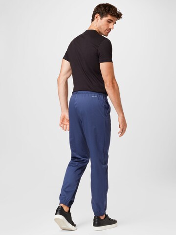 Nike Sportswear Tapered Hose in Blau