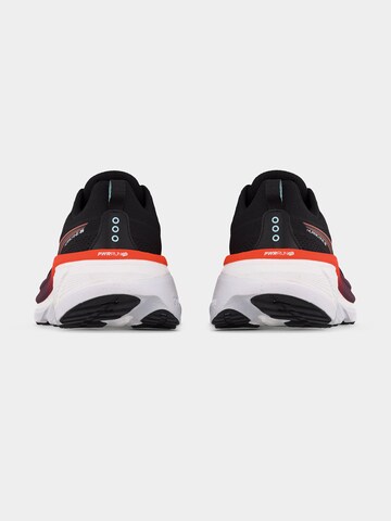 Chaussure de course saucony en noir