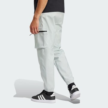 ADIDAS SPORTSWEAR Tapered Weatherproof pants 'City Escape Premium' in Grey