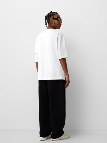 Bershka Bő szár Élére vasalt nadrágok - fekete