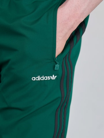 ADIDAS ORIGINALS Tapered Trousers in Green