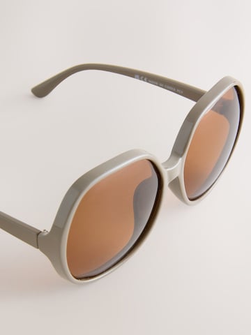 Lunettes de soleil Next en beige
