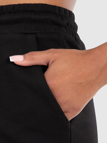 Regular Pantalon Smilodox en noir