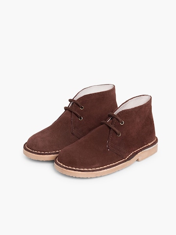 Pisamonas - Botas en marrón