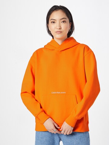 Sweat-shirt 'Institutional' Calvin Klein Jeans en orange : devant
