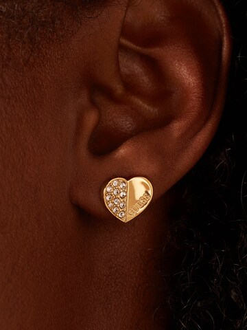 Boucles d'oreilles 'Design' GUESS en or : devant
