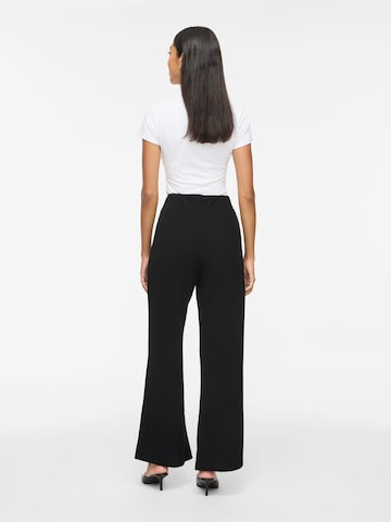 Evazați Pantaloni cu dungă de la VILA pe negru