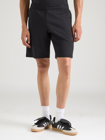 Largi Pantaloni de la ADIDAS ORIGINALS pe negru: față