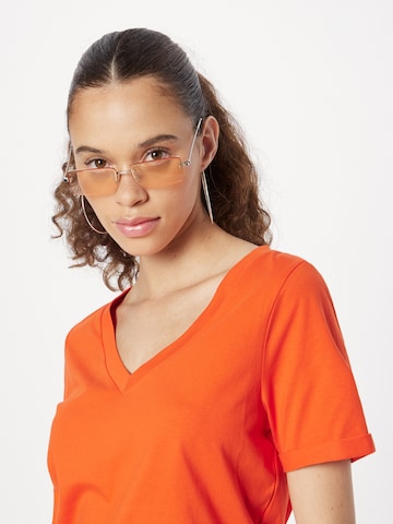 PIECES - Camiseta 'RIA' en naranja