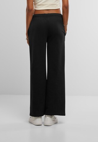 Regular Pantalon Karl Kani en noir