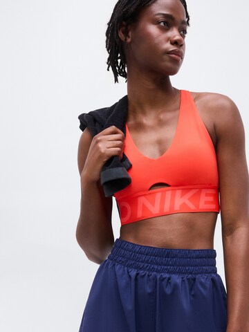 NIKE Μπουστάκι Αθλητικό σουτιέν σε πορτοκαλί