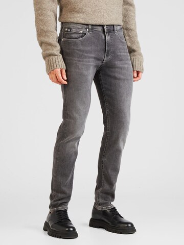 Calvin Klein Jeans - Slimfit Vaquero 'SKINNY' en gris: frente