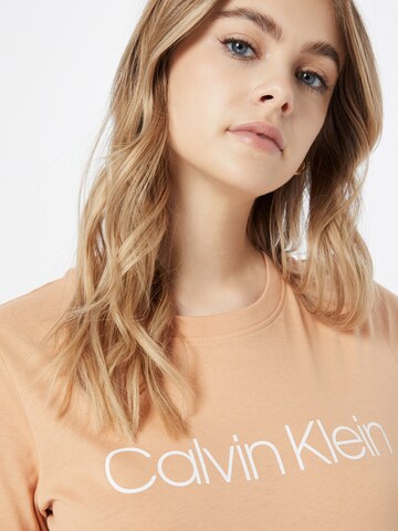 oranžs Calvin Klein T-Krekls