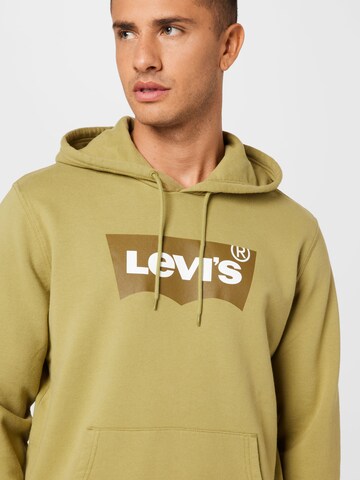 LEVI'S ®Sweater majica 'Standard Graphic Hoodie' - zelena boja