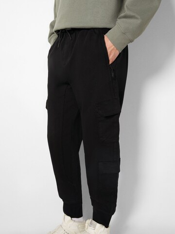 Effilé Pantalon cargo Bershka en noir