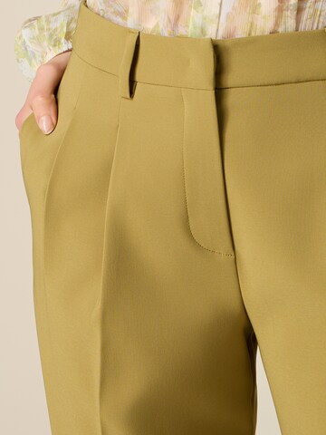 Tapered Pantaloni di oltre in verde