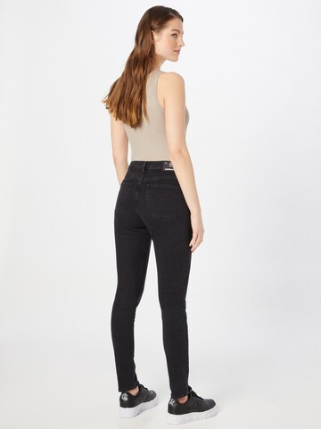 Skinny Jeans 'Tilla' di ARMEDANGELS in nero