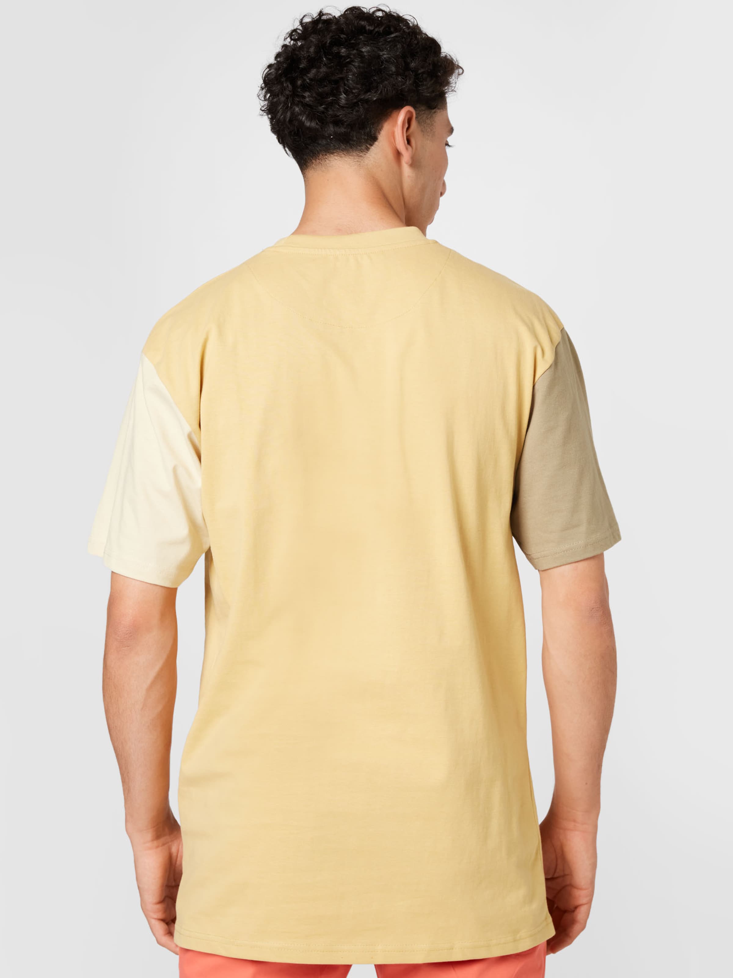 Männer Shirts Karl Kani T-Shirt in Beige, Sand - XL52395 Männer Shirts Karl Kani T-Shirt in Beige, Sand - XL52395