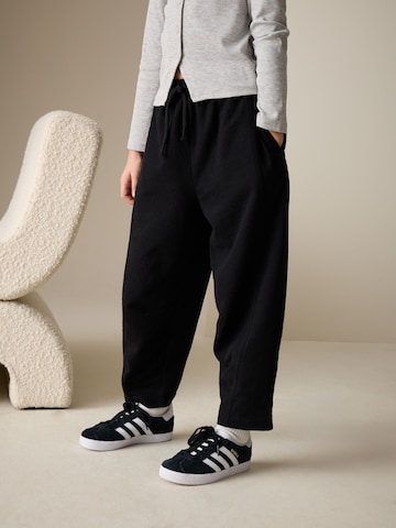 Next - Loosefit Pantalón en negro