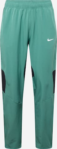 NIKE Свободный крой Спортивные штаны 'Advantage' в Зеленый: спереди