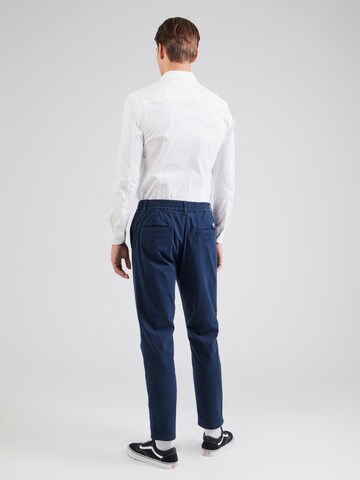 Tapered Pantaloni con pieghe di Tommy Jeans in blu