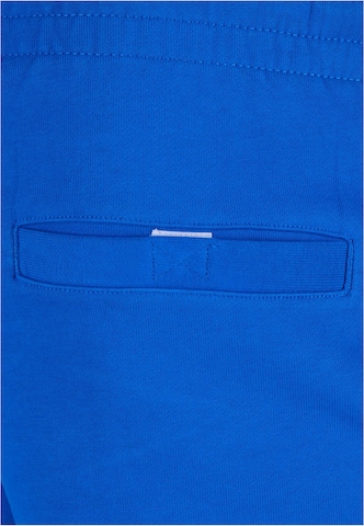Urban Classics Zwężany krój Spodnie w kolorze niebieski