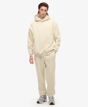 Sweat-shirt Superdry en beige : devant