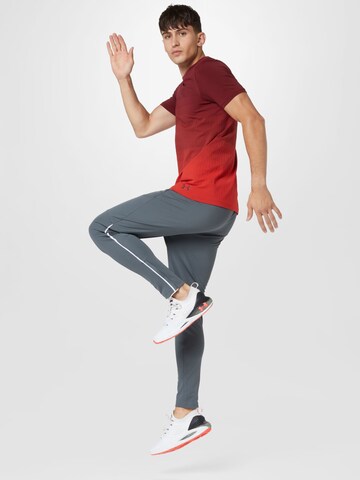 UNDER ARMOUR Skinny Sportovní kalhoty – šedá