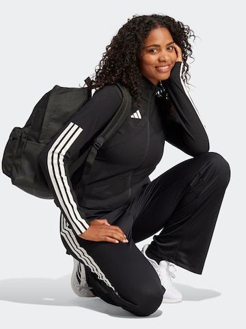 ADIDAS SPORTSWEAR Szeroka nogawka Spodnie sportowe w kolorze czarny