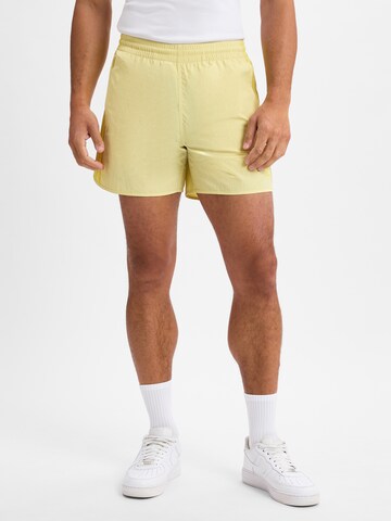 ADIDAS ORIGINALS Regular Pants ' Sprinter ' in Yellow: front