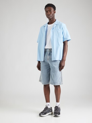 ADIDAS ORIGINALS Обычный Джинсовый комбинезон 'Adidas x Jeremy Scott' в Синий