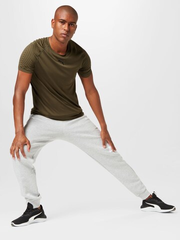 PUMA Tapered Workout Pants 'Esports E7' in Grey