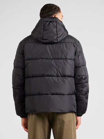 Tommy Jeans Winterjas 'ESSENTIAL' in Zwart