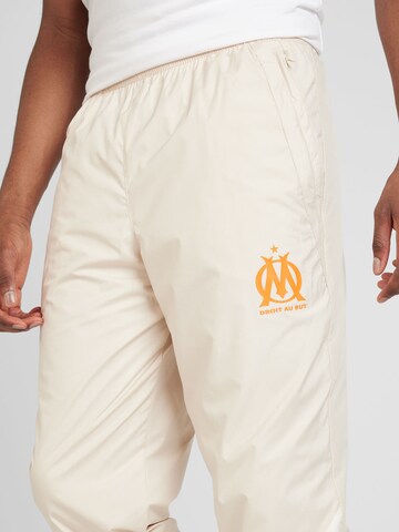 Coupe slim Pantalon de sport 'OM Prematch' PUMA en beige