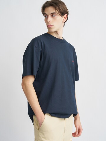 Carhartt WIP T-Shirt 'American Script' in Blau