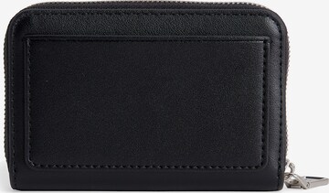 Porte-monnaies Calvin Klein Jeans en noir