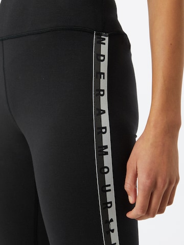 UNDER ARMOUR Skinny Sports trousers in Black