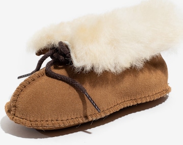 Minnetonka Boots 'Sheepskin' in Brown