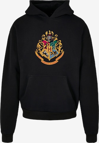 Sweat-shirt 'Harry Potter Hogwarts Crest Gold' F4NT4STIC en noir : devant
